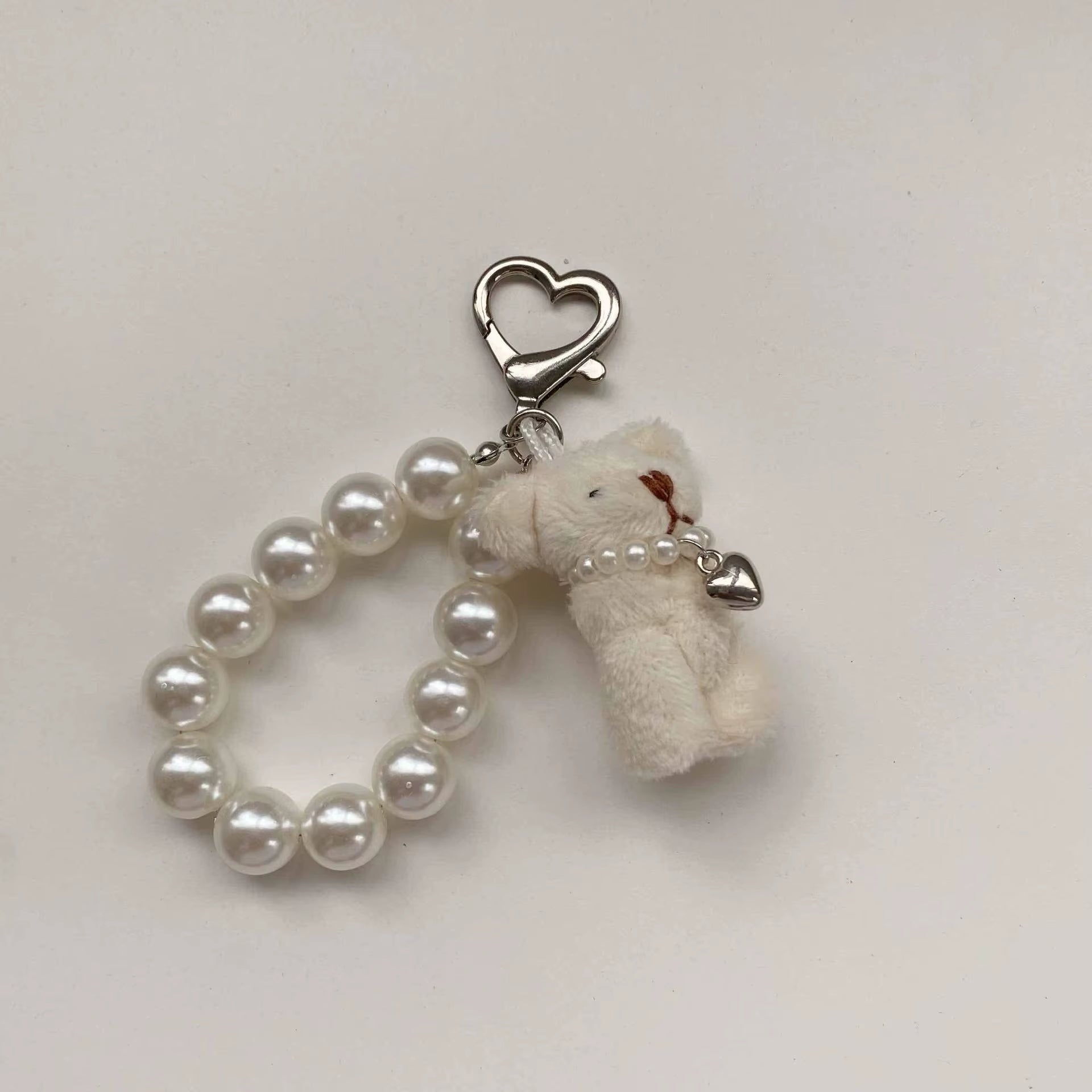 Pearl Teddy Bear Charm | Teddy Bear Keychain | Cute Bag Accessory | Phone Charm | Keychain Accessory | Soft Toy Charm | Adorable Key Ring | Plush Bear Keychain | Fashion Accessory | Gift for Her | Cute Bear Pendant | Trendy Bag Charm | Mini Teddy Keychain | Stylish Key Holder | Pearl Charm