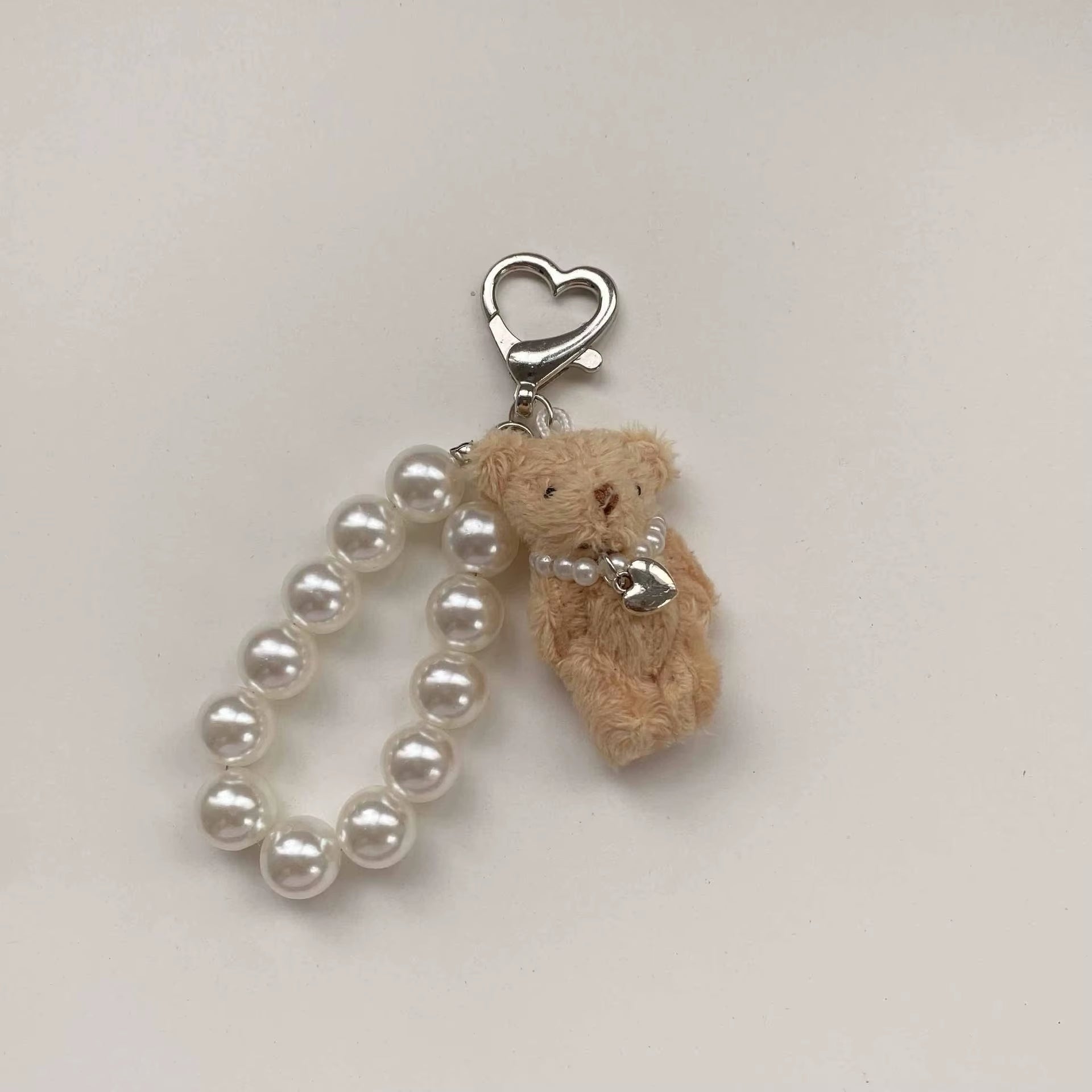 Pearl Teddy Bear Charm | Teddy Bear Keychain | Cute Bag Accessory | Phone Charm | Keychain Accessory | Soft Toy Charm | Adorable Key Ring | Plush Bear Keychain | Fashion Accessory | Gift for Her | Cute Bear Pendant | Trendy Bag Charm | Mini Teddy Keychain | Stylish Key Holder | Pearl Charm